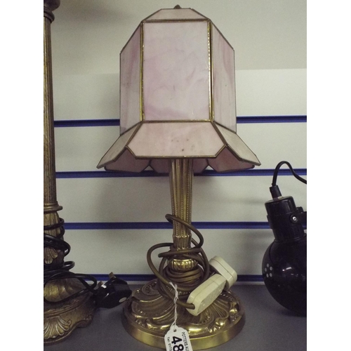 485 - Brass table lamp with pink glass shade in the deco style