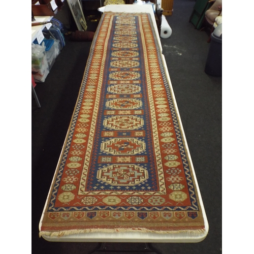 415 - Turkish Runner measuring 10ft 4 X 29 inches wide.