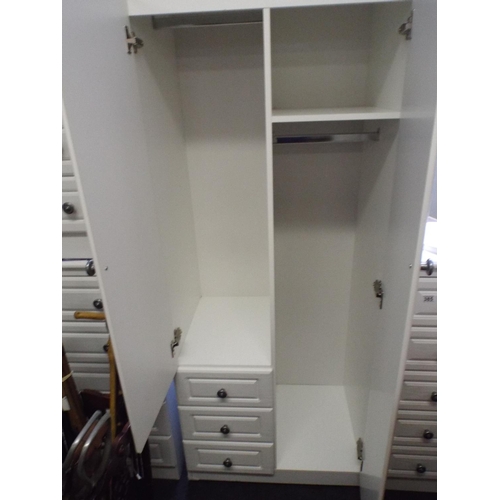 386 - A Wardrobe with Mirror door and three drawers 72 X 31 inches, excellent condtion