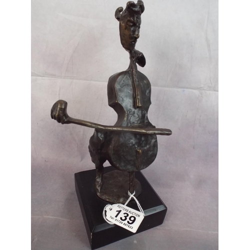 139 - Smaller bronze Alloy Stylised Musician.