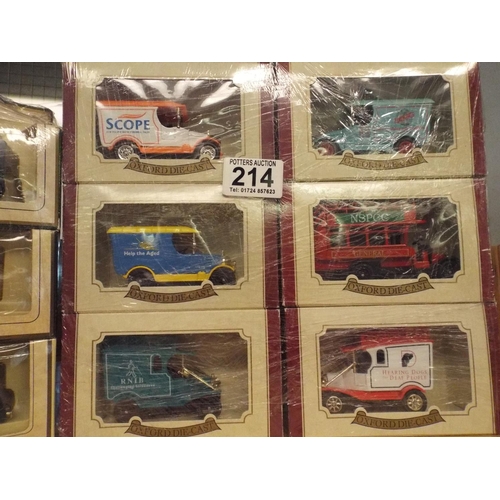 214 - Twelve Boxed and as new die cast trucks