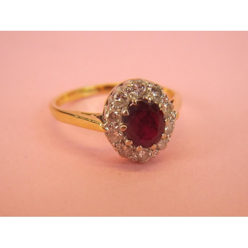 34 - 18ct Ruby & Diamond set ring. 3.7g  Finger size 'M'