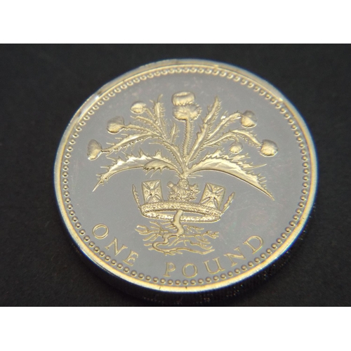 63 - Sterling Silver One Pound coin. In presentation box and in protective plastic bubble. Mint.