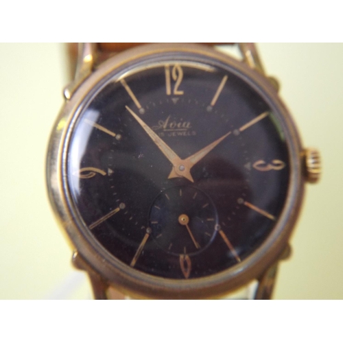 92 - Avia. 15 Jewel Gents Mechanical Watch with leather strap in good working order.