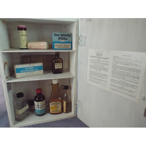 281 - Vintage wall mounted medical cabinet with contents