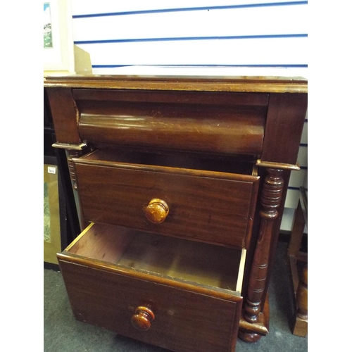 307 - Victorian Era three drawer set of drawers with turned supports.