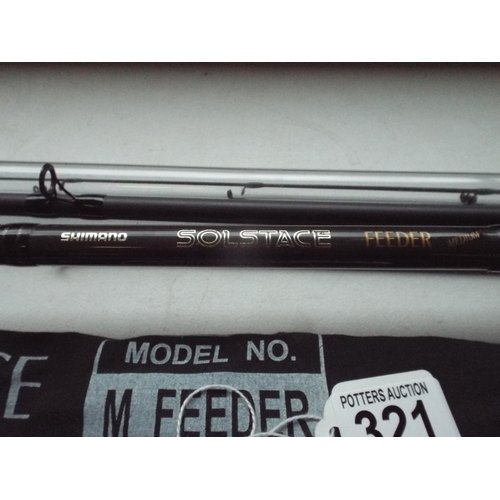 321 - Shimano Solstice medium feeder carbon fibre 3 piece rod with super tips. With bag.