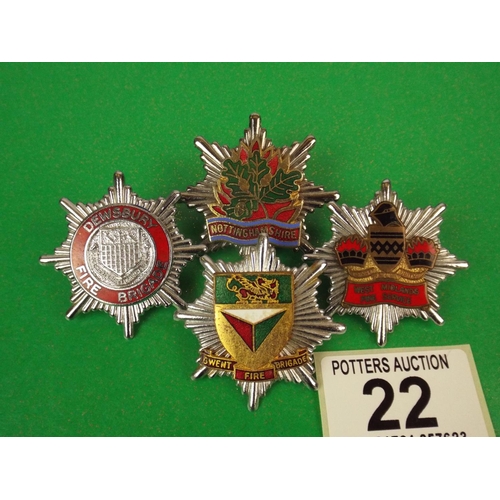 22 - Four metal and ename fire brigade badges