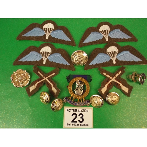 23 - Various parachute insignia, military buttons, collar dogs etc.