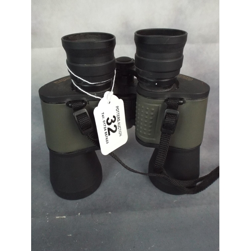 32 - Pair of 'Blackfoot' 10 X 50 wide angle military style Binoculars with soft case (fault to one eyepie... 