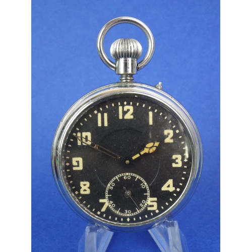 42 - Military style pocket watch with black face and luminous numbers & hands. Working order.