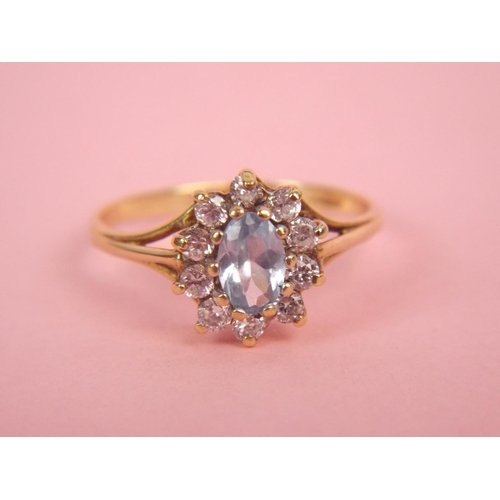 48 - 9ct Gold. Aquamarine & CZ set ring.