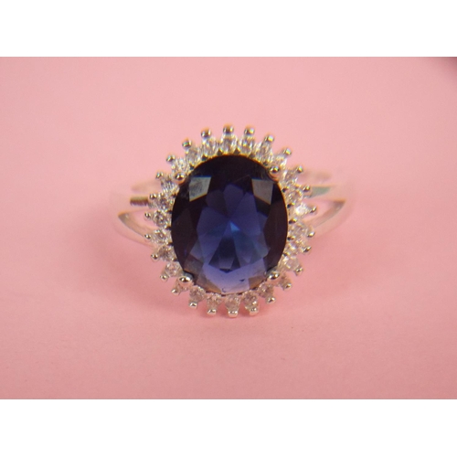 56 - Ladies ring marked 925. finger size 'P5'  set with sapphire coloured stone.