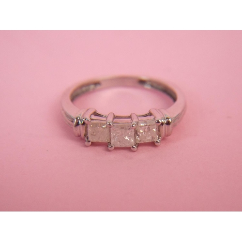 63 - 14ct, Three Diamond set ring. Finger size 'L5'   2.9g