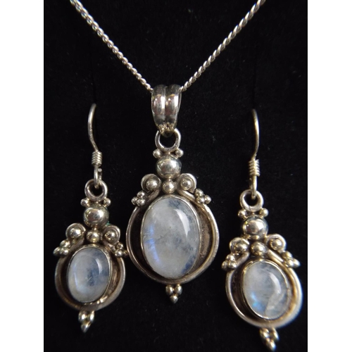 66 - 925 silver moonstone pendant with matching earrings.