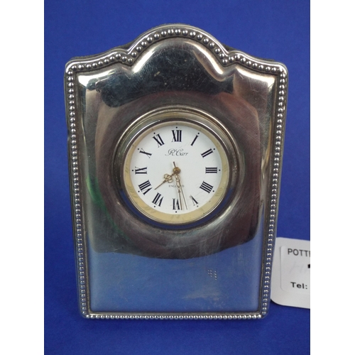 11 - Carr's of Sheffield, small silver desk clock. Hallmarked for 1994. Requires battery etc.