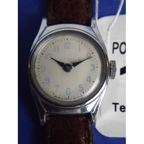 124 - Timex shockproof Cinderella watch with leather strap. Working order.