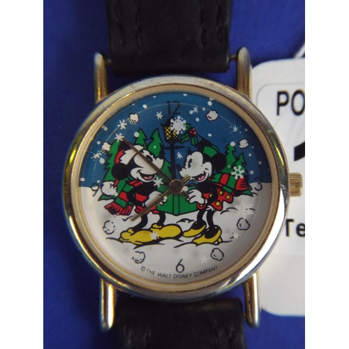 125 - Micky Mouse watch with quartz movement. Leather strap. Working order.