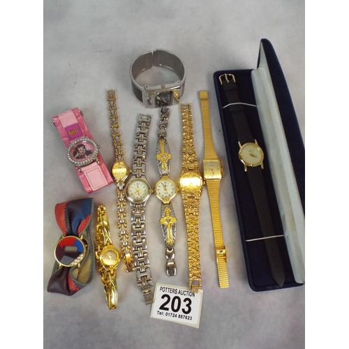 203 - Assorted ladies quartz watches requiring batteries.