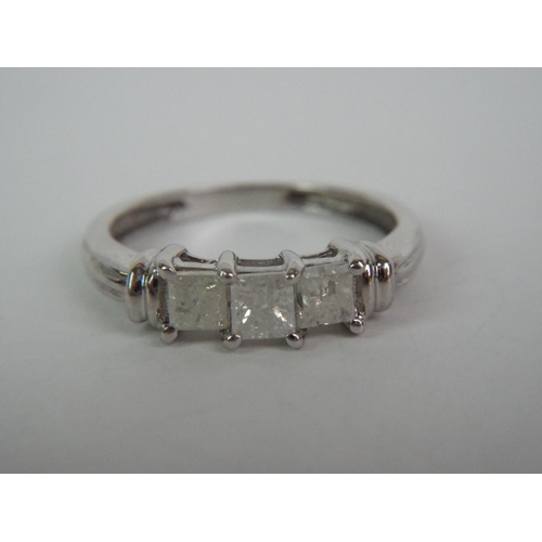 29 - Three Diamond set ring in 14ct White gold mount. 'L5'