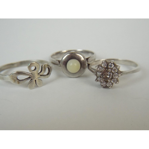 30 - Three White metal dress rings