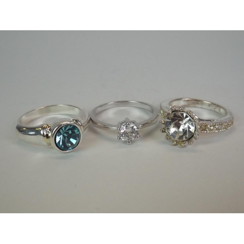 33 - Three stone set fancy rings