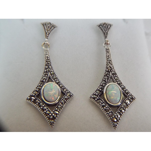 34 - Pair of Opal set silver marcasite drop earrings.