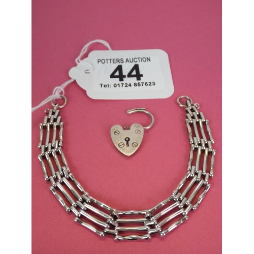 44 - 925 Silver four bar bracelet with heart shaped padlock clasp. Birmingham 1978