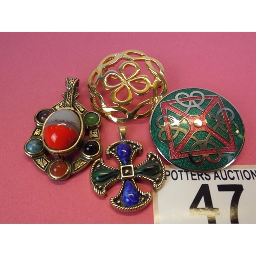 47 - Two Celtic brooches plus two scottish agate set pendants.