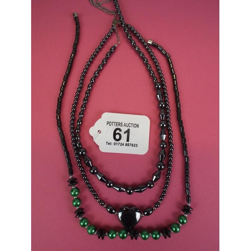 61 - Three hermatite necklaces