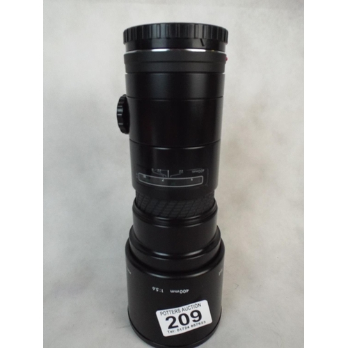 209 - Sigma. 75-400 mm Zoom lens with case & box.