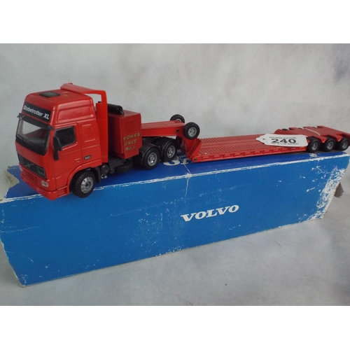 240 - Die cast scale model of a Volvo articulated low loader with box.