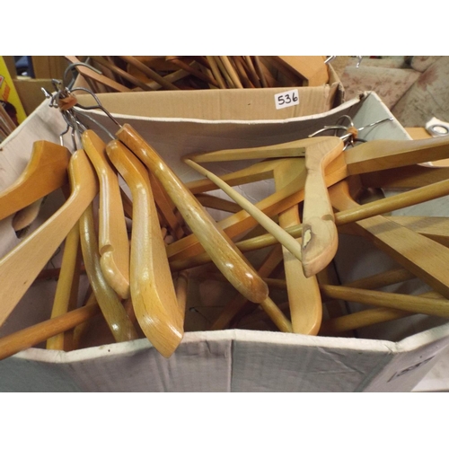 537 - Box of wooden coat hangers