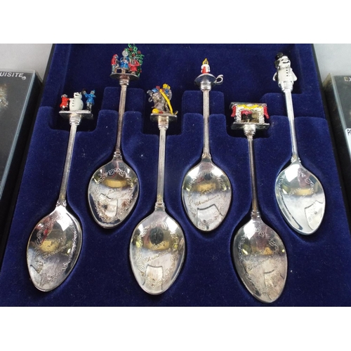 100 - Boxed set of Enamelled finial christmas spoons plus two others by Exquisite.