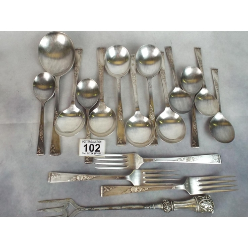 102 - Selection of heavily silver plated spoons, forks etc plus silver handled toasting fork.