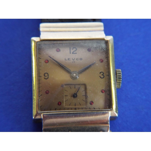 109 - Levco, 17 jewel  watch with leather strap & 14ct Gold case. Ruby  number indicators. Running order.