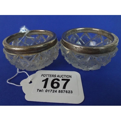 167 - Pair of Silver topped cut glass salts. Chester 1906