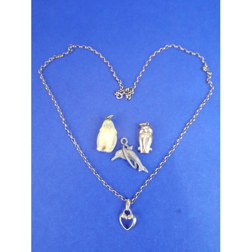 74 - 20 Inch 9ct Gold Chain with 9ct Pendant. Other charms included. 5.4g