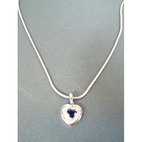 172 - 18ct white gold Sapphire and Diamond set pendant on an 18ct white gold rope. 11.1g