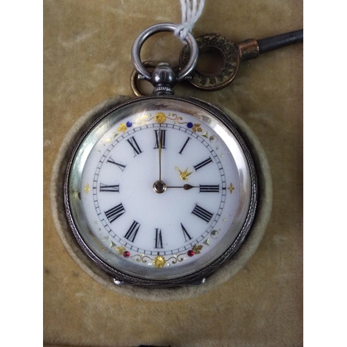 36 - Continental silver ladies pocket watch in original box and key. Non runner for spares/repairs.