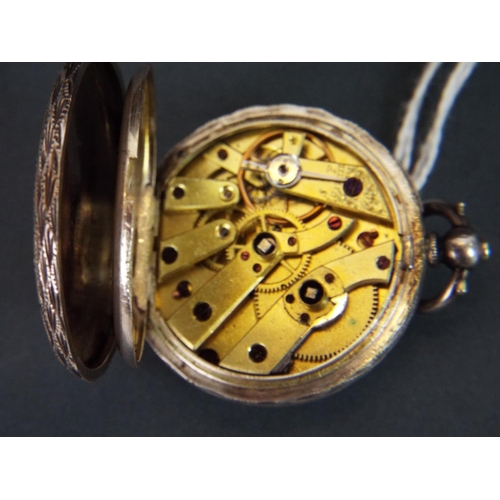 36 - Continental silver ladies pocket watch in original box and key. Non runner for spares/repairs.