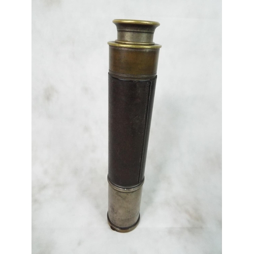 65 - Vintage Brass telescope with hinged lens cover and leather sleeve. Good optics and useable telescope... 