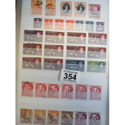 354 - Full album of commonwealth postage stamps plus windsor stamp album