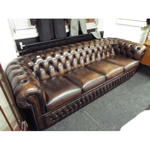 379 - Large brown leather chesterfield four seater settee