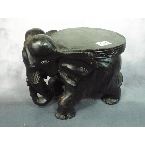 431 - Heavy ebonised plant stand as elephant