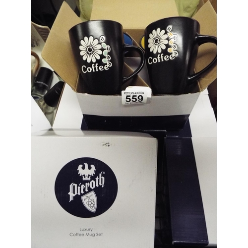 559 - nine boxs of four luxury coffe mugs,