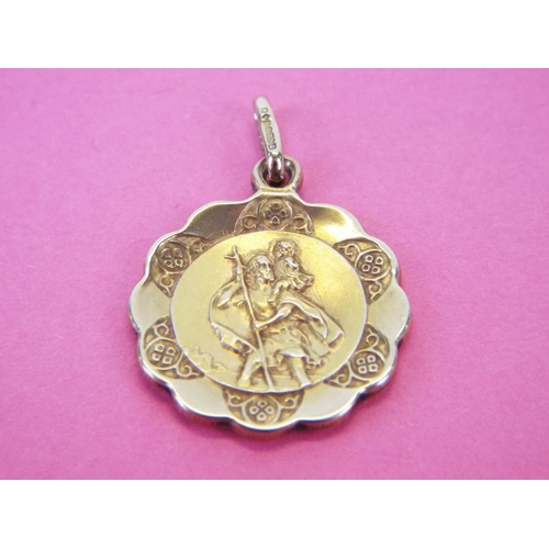 61 - 9ct gold st christopher pendant. 1.6g