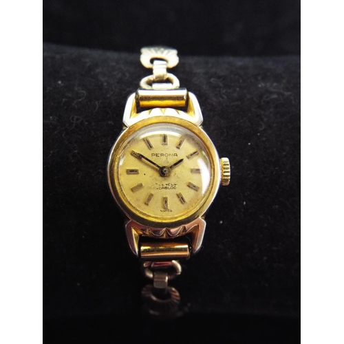 76 - 7 jewel swiss ladies watch with rolled gold strap in working order