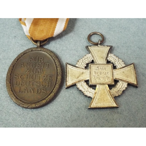 20 - Two Reproduction WW2 German medals