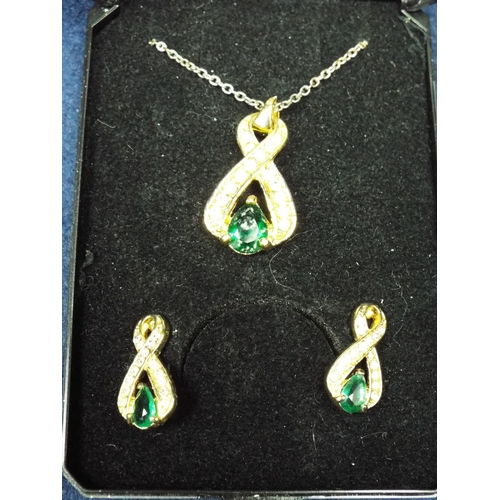 59 - Costume stone set pendant and earring set in presentation box